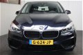 BMW 2-serie Active Tourer - 218i NAVIGATIE LIMIT CONTROL AIRCO BLUETOOTH TEL MEDIA VOORBEREIDING PDC - 1 - Thumbnail