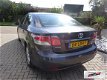 Toyota Avensis - 2.0 D-4D Sedan 2010 Leer 1E Eigenaar - 1 - Thumbnail