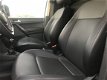 Volkswagen Caddy - 2.0 TDI L1H1 BMT Highline 150 PK LEER BEKL. AIRCO CRUISE GROOT NAV LMV VERLAAGD - 1 - Thumbnail