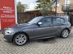 BMW 1-serie - 2.0 120D 184Pk 5DR AUT M-Sport Centennial High Executive - 1 - Thumbnail