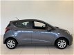 Hyundai i10 - 1.0i i-Motion Comf. Climate | Cruise | € 1.000, - Slooppremie - 1 - Thumbnail