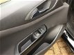 Opel Corsa - 1.4 Edition AIRCO.LMV.CRUISE.I-LINK NAVIGATIE - 1 - Thumbnail