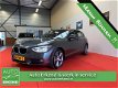 BMW 1-serie - 118i Business+ Automaat 8 Garantie, NAP vanaf €199 - 1 - Thumbnail