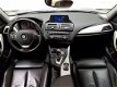 BMW 1-serie - 118i Business+ Automaat 8 Garantie, NAP vanaf €199 - 1 - Thumbnail