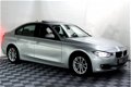 BMW 3-serie - 320i xDrive Executive AUT SCHUIFDAK NAVI XENON BT PDC '12 - 1 - Thumbnail