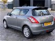 Suzuki Swift - 1.2 Bandit, Airco, Stoelverwarming, NL Auto - 1 - Thumbnail