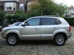 Hyundai Tucson - 2.0i 4WD Style Trekhaak Airco - 1 - Thumbnail