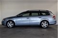 Volkswagen Passat Variant - 2.0 TDI 140PK DSG NAVI/PDC V+A/17INCH/FLIPPERS/WINTERSET - 1 - Thumbnail