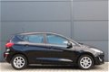 Ford Fiesta - 1.0 EcoBoost 100pk Titanium | AUTOMAAT | Winterpack | Quickclear verwarmde voorruit | - 1 - Thumbnail