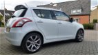 Suzuki Swift - 1.2 Comfort EASSS 5 Deurs Airco parelmoer wit 5 deurs airco lm velgen - 1 - Thumbnail