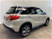 Suzuki Vitara - 1.6 Exclusive NAVI-AIRCO/ECC-LMV-PARC.CAMERA-CRUISE-DAKRAILS End Of Year Sale - 1 - Thumbnail