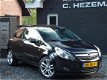 Opel Corsa - 1.4-16V Sport - 1 - Thumbnail