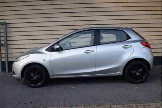 Mazda 2 - 2 1.3HP S-VT TOURING Trekhaak, 15 inch LMV, Airco - 1