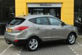 Hyundai ix35 - 2.0i Business Edition / LEER / NAVI / TREKHAAK / CAMERA / 152.000 KM - 1 - Thumbnail