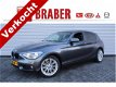 BMW 1-serie - 118i Business+ | Automaat | 1e eigenaar | Prachtig mooie auto | Navi | Airco | LM velg - 1 - Thumbnail