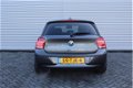 BMW 1-serie - 118i Business+ | Automaat | 1e eigenaar | Prachtig mooie auto | Navi | Airco | LM velg - 1 - Thumbnail