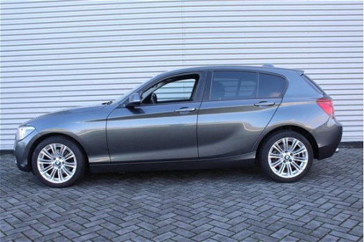 BMW 1-serie - 118i Business+ | Automaat | 1e eigenaar | Prachtig mooie auto | Navi | Airco | LM velg - 1
