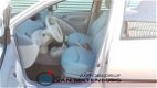 Toyota Yaris - 1.0-16V VVT-i Terra Airco Trekhaak Rijklaar - 1 - Thumbnail