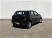 Dacia Sandero - TCe 90 Serie Limite Royaal / Airco / Cruise / PDC / DAB radio / - 1 - Thumbnail