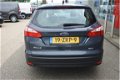 Ford Focus Wagon - 1.0 EcoBoost Titanium | Navigatie | Bluetooth | Climate en cruise control | Parke - 1 - Thumbnail