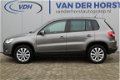 Volkswagen Tiguan - 2.0-141pk. TDI Trend&Fun 4Motion. Trekhaak, airco, navi Nette auto - 1 - Thumbnail