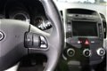 Kia Cee'd - 1.4 CVVT Seven airco / navigatie / cruise control - 1 - Thumbnail