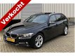 BMW 3-serie Touring - 318d High Exe 143PK Navigatie/Sportstoelen/Trekhaak (elektr)/Panoramadak Compl - 1 - Thumbnail