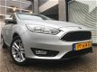 Ford Focus Wagon - 1.0 Lease Edition 125Pk/1Ste Eigenaar/Navi/Cruise/Parkeersensoren - 1 - Thumbnail