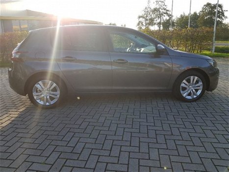 Peugeot 308 - 1.2 PureTech Blue Lease Executive Panorama / Navigatie / Ecc - 1