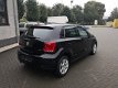 Volkswagen Polo - 1.2 TSI Highline navi / clima / stoelverw. / cruise control 2012 110.000km - 1 - Thumbnail