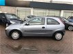 Opel Corsa - 1.4 16V Njoy El. ramen Radio/cd Schuifk.dak Parrot 113.576km - 1 - Thumbnail