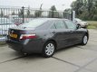 Toyota Camry - 2.4 HYBRID LEDER/ NAVI/ KEYLESS/ SCHUIFDAK - 1 - Thumbnail