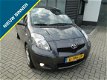 Toyota Yaris - 1.3 VVTi Dynamic Lim 6 bak Airco Boekjes - 1 - Thumbnail