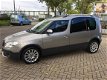 Skoda Roomster - 1.2 TSI 77KW AMBITION AUTOMAAT - 1 - Thumbnail