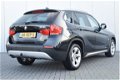 BMW X1 - 1.8d sDrive Executive Automaat Navi/Camera Ecc Cruise Pdc Priv/glass Trekhaak - 1 - Thumbnail