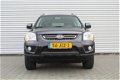 Kia Sportage - 2.0 CVVT X-ecutive | Airco | Dealeronderhouden | Cruise | Leder stuurwiel | - 1 - Thumbnail