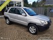 Kia Sportage - 2.0 CVVT Executive - 1 - Thumbnail