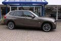BMW X1 - 2.0d sDrive Executive, leer, LM, NAV, 1e eigenaar - 1 - Thumbnail