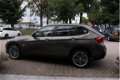 BMW X1 - 2.0d sDrive Executive, leer, LM, NAV, 1e eigenaar - 1 - Thumbnail