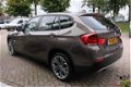 BMW X1 - 2.0d sDrive Executive, leer, LM, NAV, 1e eigenaar - 1 - Thumbnail