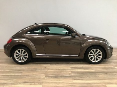 Volkswagen Beetle - 1.2 TSI Design NAVI / CLIMA / CRUISE / STOELVERW / ARMSTEUN / PDC V+A / LMV / HE - 1