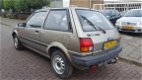 Toyota Starlet - 1.3 DX ...BIEDING - 1 - Thumbnail