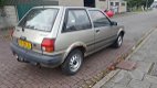 Toyota Starlet - 1.3 DX ...BIEDING - 1 - Thumbnail