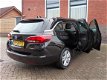 Opel Astra Sports Tourer - 1.4 Online Edition 150 pk | Trekhaak - 1 - Thumbnail