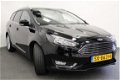 Ford Focus Wagon - 1.0 100 PK Titanium | Clima | Navi | Parkeersensoren v + a | - 1 - Thumbnail