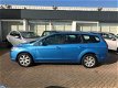 Ford Focus Wagon - 1.4 16v Trend Telef. functie Airco Cruise Radio/cd etc - 1 - Thumbnail