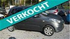 Hyundai i10 - 1.2 i-Motion Cool zeer luxe uitvoering nieuw-model met airco 4x el-ramen cv ondh-boekj - 1 - Thumbnail