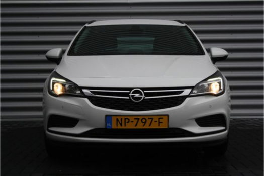 Opel Astra Sports Tourer - 1.0 TURBO 105PK ONLINE EDITION / NAVI / AIRCO / LED / AGR / PDC / ONSTAR - 1