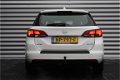 Opel Astra Sports Tourer - 1.0 TURBO 105PK ONLINE EDITION / NAVI / AIRCO / LED / AGR / PDC / ONSTAR - 1 - Thumbnail