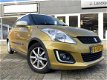 Suzuki Swift - 1.2 Dynamic 5-drs Goldstar - 1 - Thumbnail